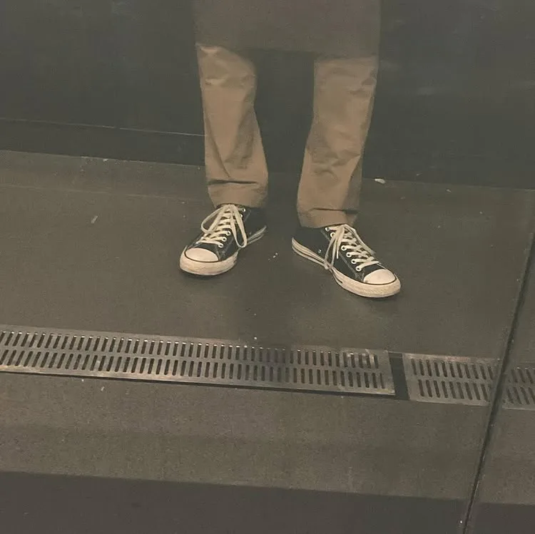 My feet in the restaurant's lift, the summer I worked as a chef